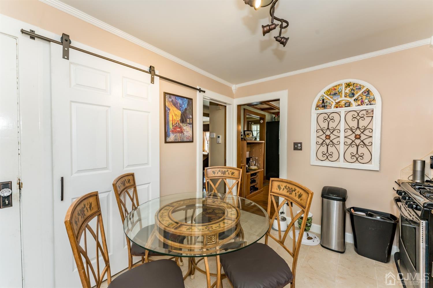 729 Livingston Road Elizabeth, NJ 07208 - Photo 12 of 26 a dining room with furniture and window