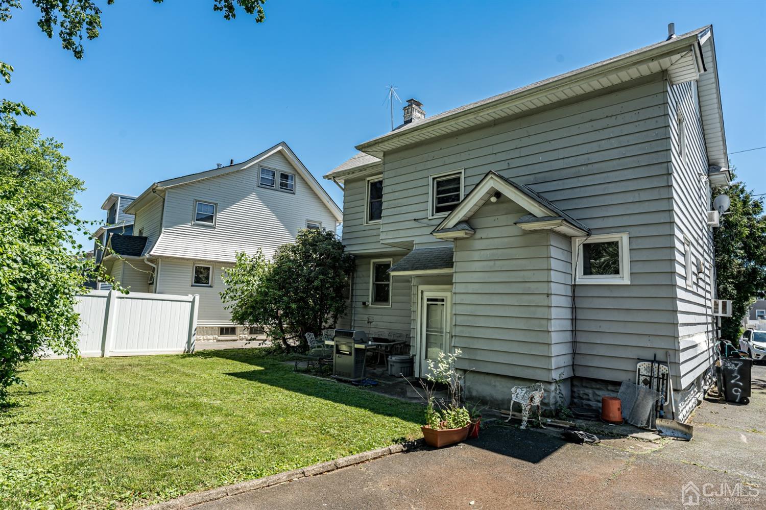 729 Livingston Road Elizabeth, NJ 07208 - Photo 24 of 26 a view of a house with a yard