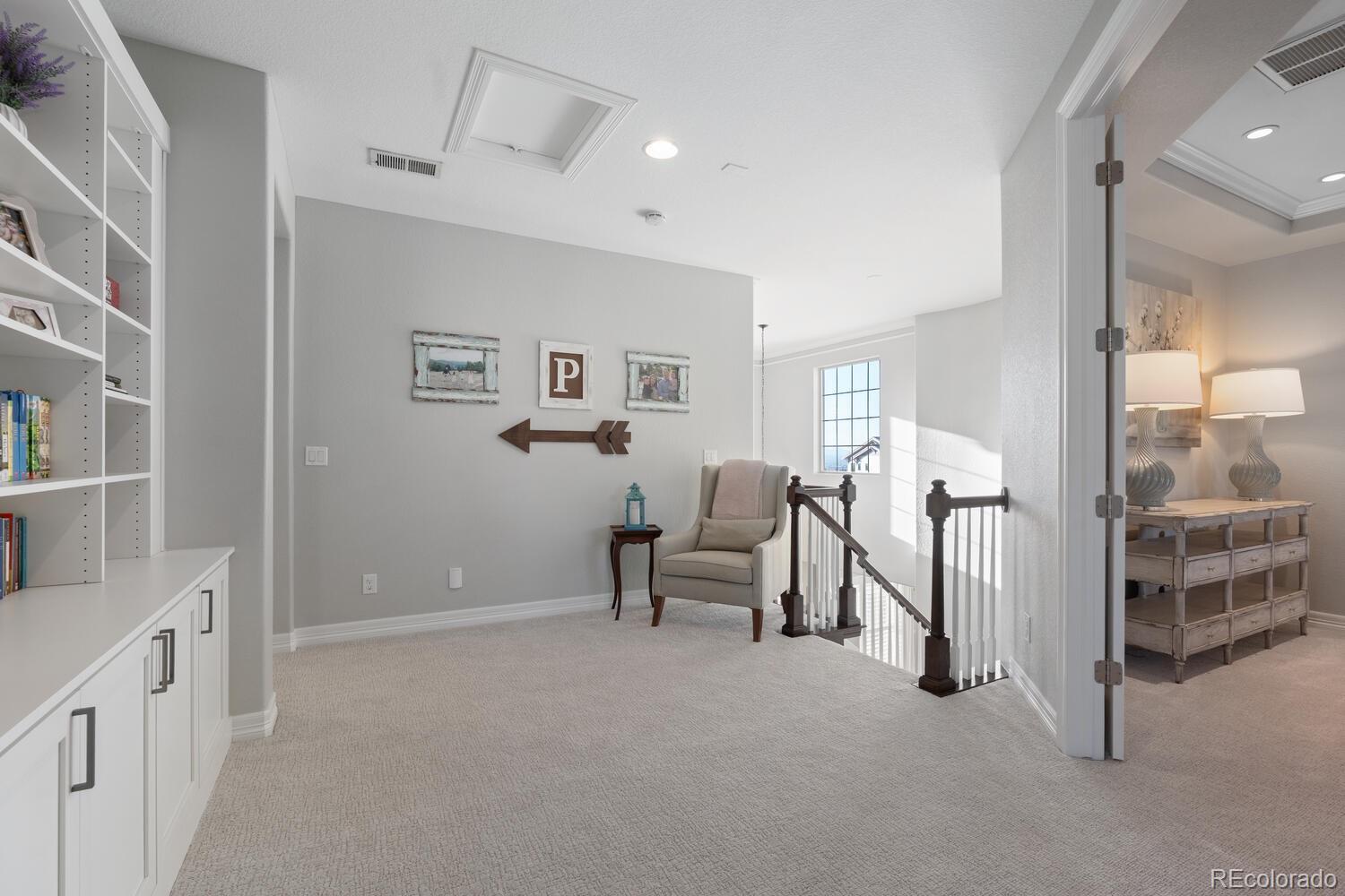 10800 Sundial Rim Road Highlands Ranch, CO 80126 - Photo 20 of 48 a view of livingroom with furniture and windows