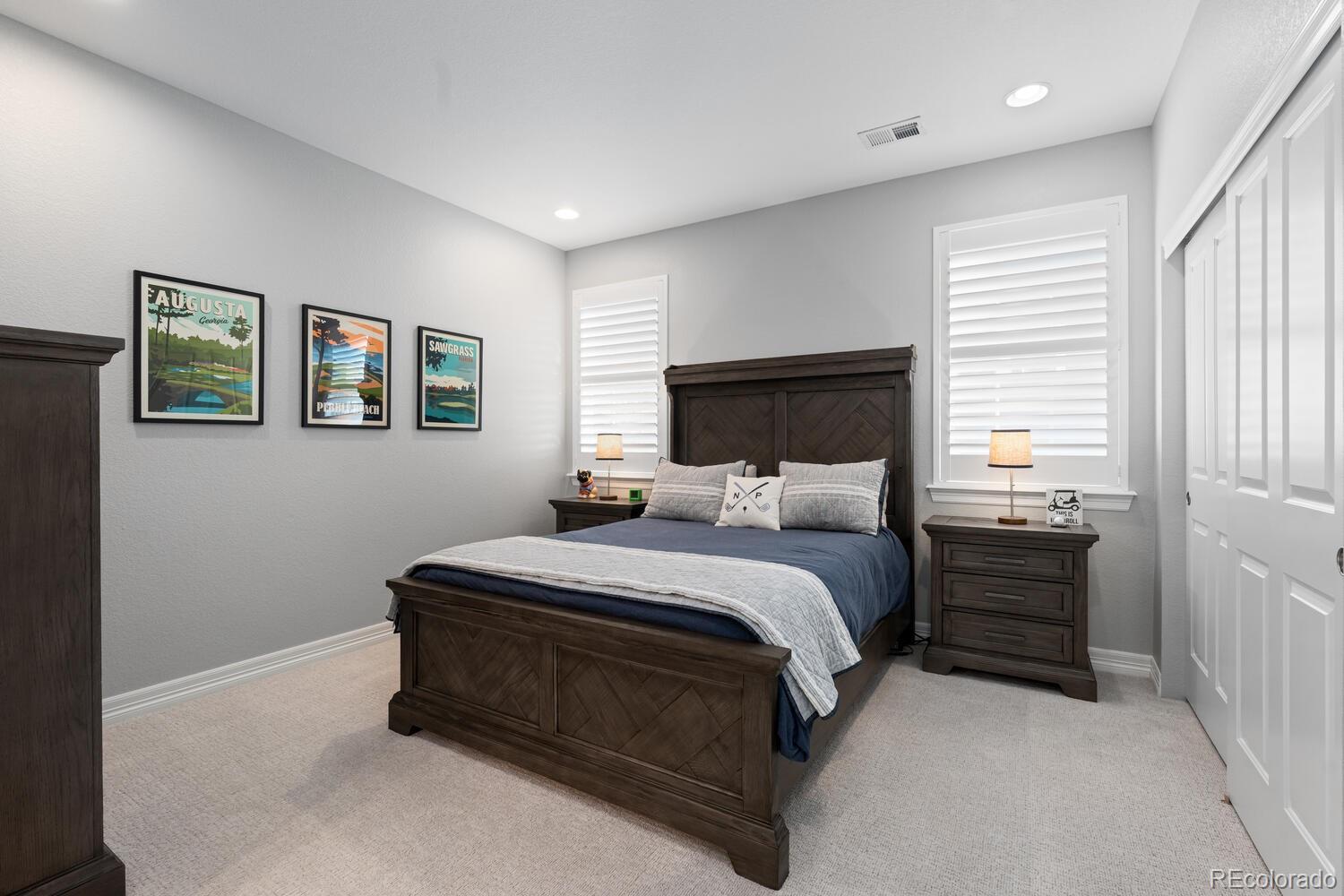 10800 Sundial Rim Road Highlands Ranch, CO 80126 - Photo 29 of 48 a bedroom with a bed and a window