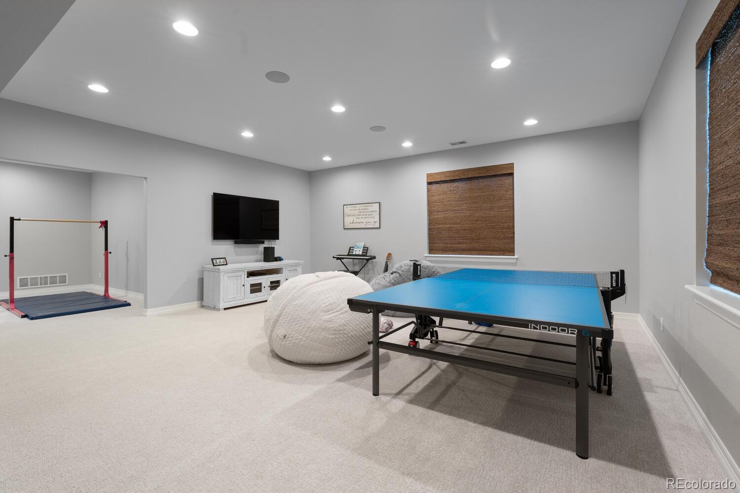 10800 Sundial Rim Road Highlands Ranch, CO 80126 - Photo 36 of 48 a room with furniture pool table and flat screen tv