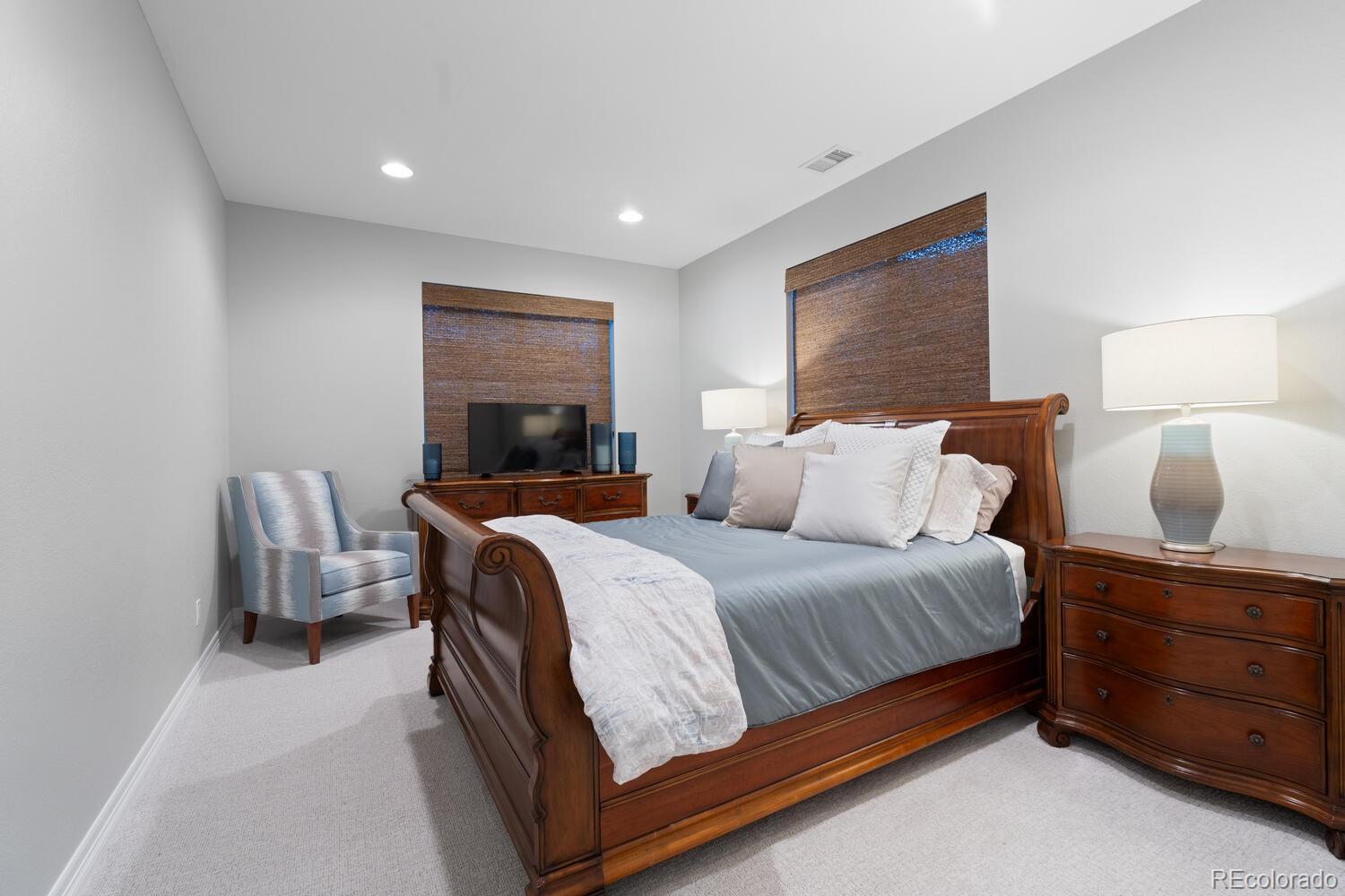 10800 Sundial Rim Road Highlands Ranch, CO 80126 - Photo 40 of 48 a bedroom with a bed and window