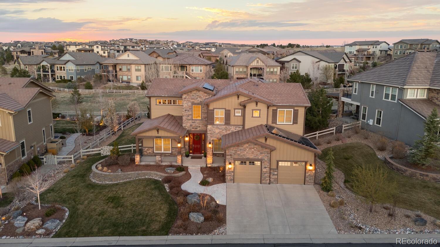10800 Sundial Rim Road Highlands Ranch, CO 80126 - Photo 44 of 48 an aerial view of a house
