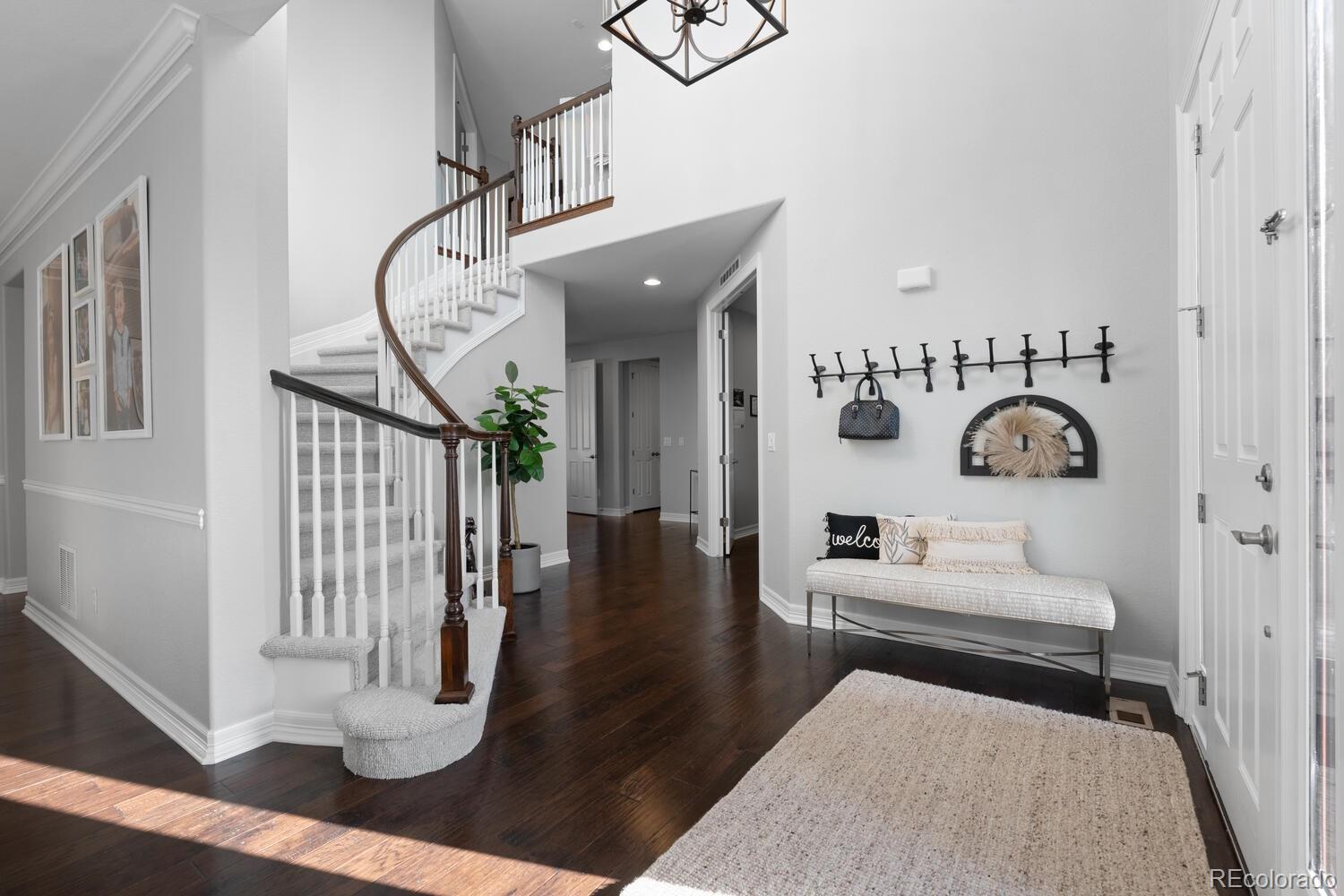 10800 Sundial Rim Road Highlands Ranch, CO 80126 - Photo 5 of 48 a living room with furniture and a window