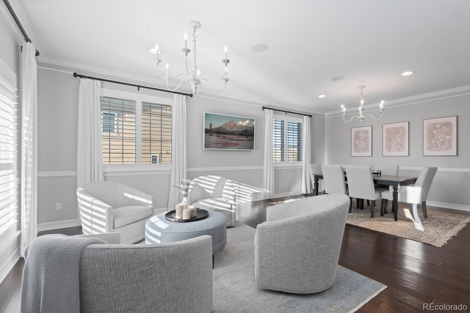 10800 Sundial Rim Road Highlands Ranch, CO 80126 - Photo 6 of 48 a living room with furniture and wooden floor