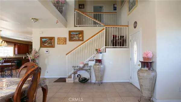 a view of a livingroom with furniture and windows