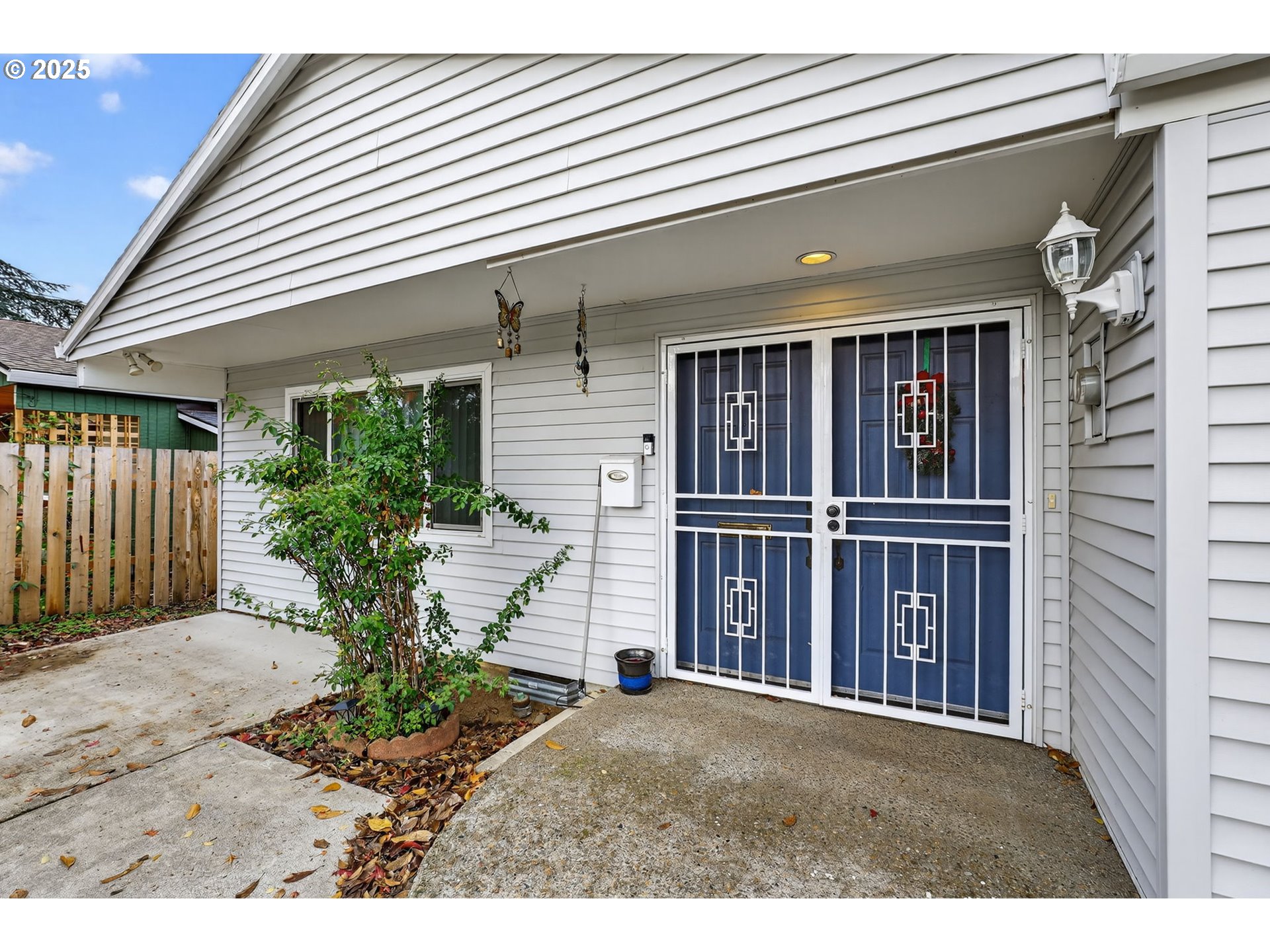 8739 Southeast Knapp Street Portland, OR 97266 - Photo 4 of 23 a view of a house with entrance gate