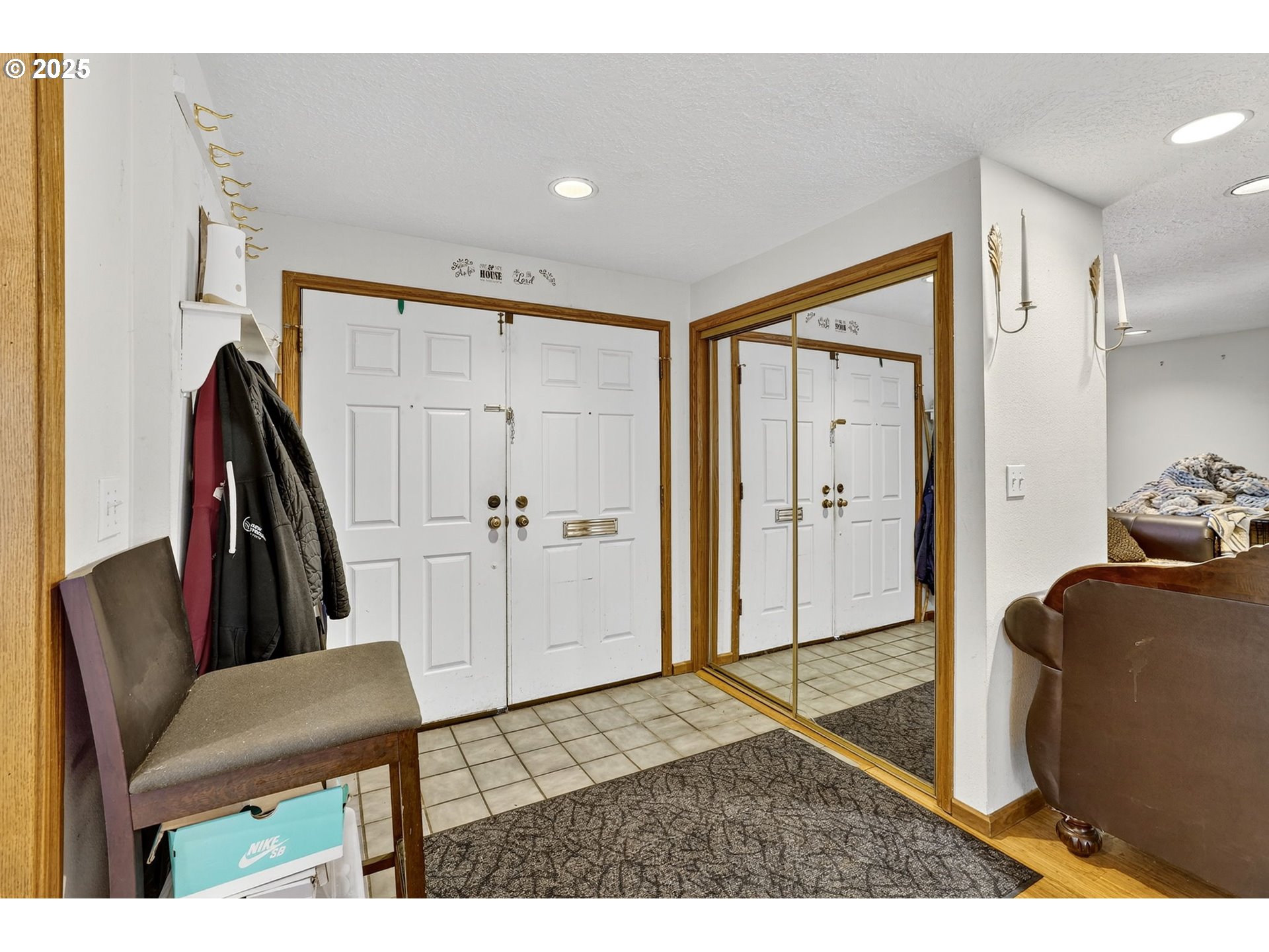 8739 Southeast Knapp Street Portland, OR 97266 - Photo 5 of 23 a living room with furniture and a rug