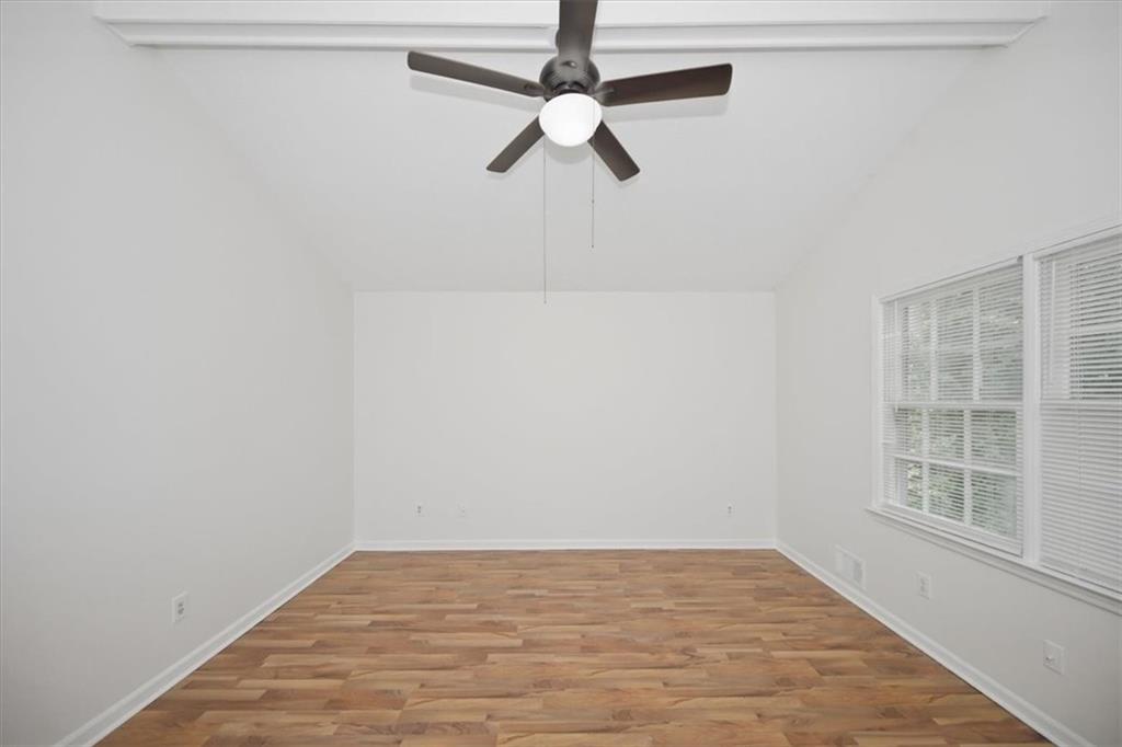 1496 Cherry Hill Road Southwest Conyers, GA 30094 - Photo 14 of 32 a view of an empty room with a window