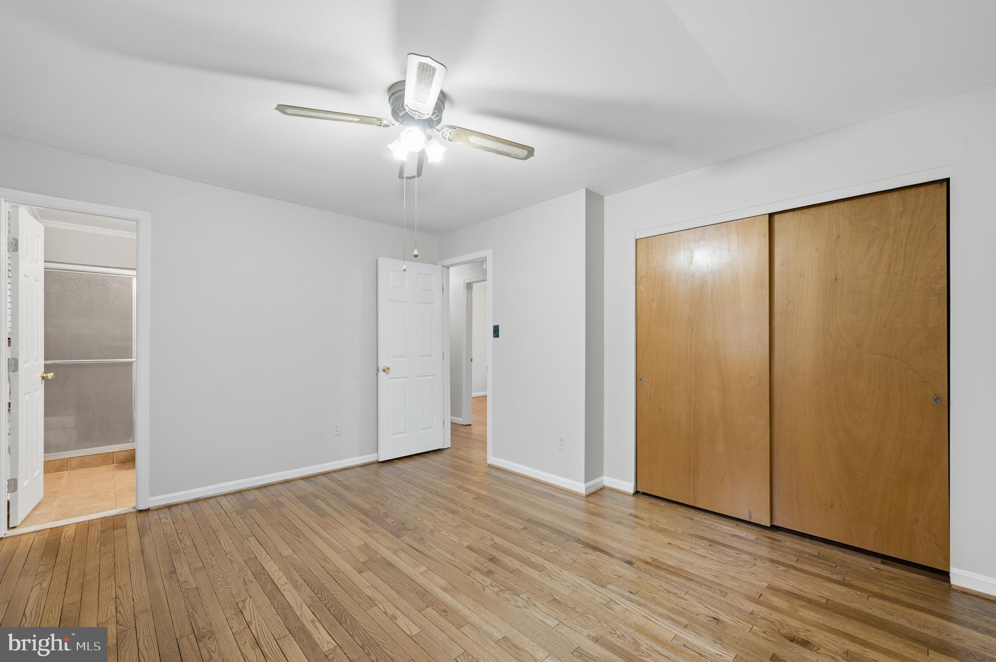 5253 Briscoe Farm Road Waldorf, MD 20601 - Photo 22 of 57 Primary bedroom w/ hardwood flooring