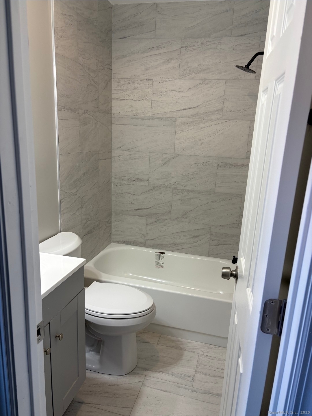 190 Howard Avenue, Unit 1 Ansonia, CT 06401 - Photo 7 of 7 a bathroom with a toilet and a shower