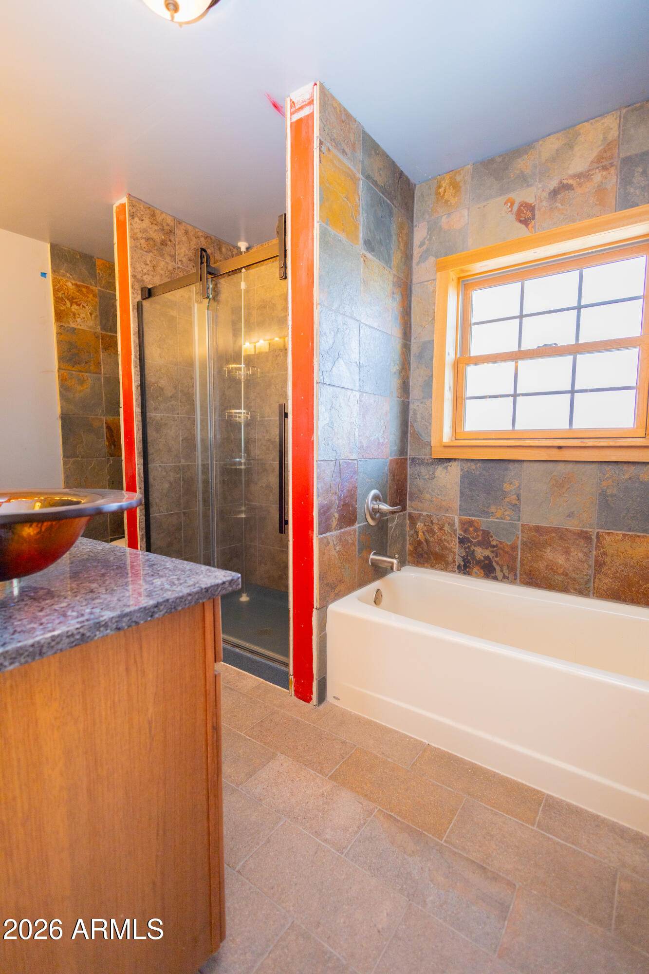 3429 West Markel Road Douglas, AZ 85607 - Photo 31 of 47 a bathroom with a granite countertop sink and a bathtub