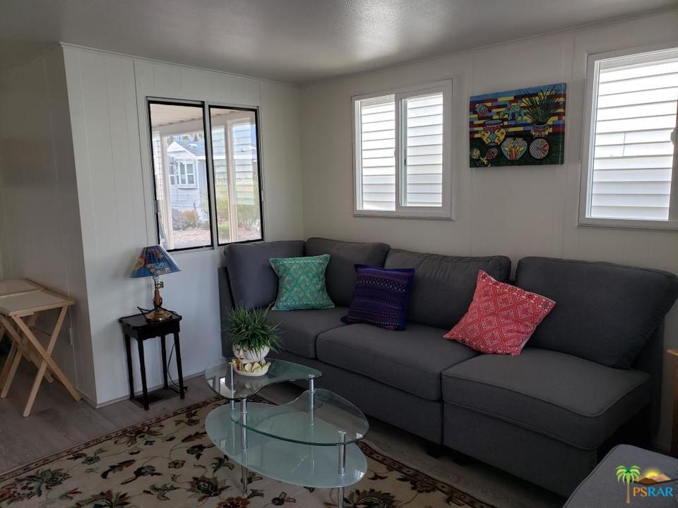 69801 Ramon Road, Unit 192 Cathedral City, CA 92234 - Photo 5 of 14 a living room with furniture and a window