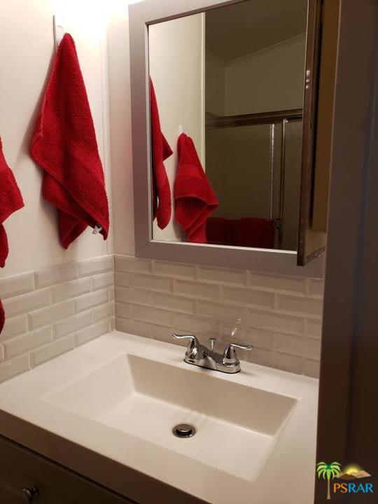 69801 Ramon Road, Unit 192 Cathedral City, CA 92234 - Photo 8 of 14 a bathroom with a sink and a bathtub