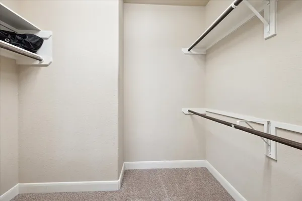 a view of a room with racks on the wall