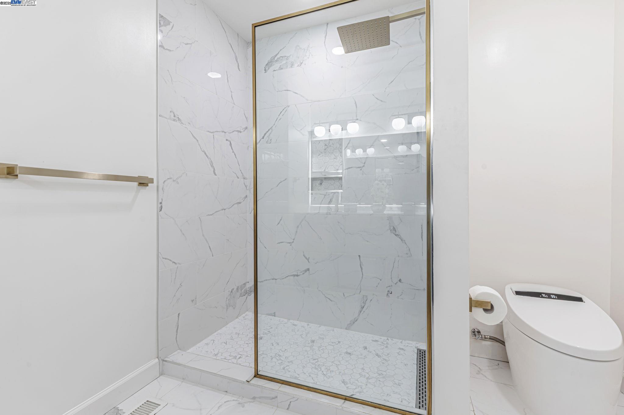 1835 Camino Estrada Concord, CA 94521 - Photo 13 of 27 a bathroom with a glass door shower