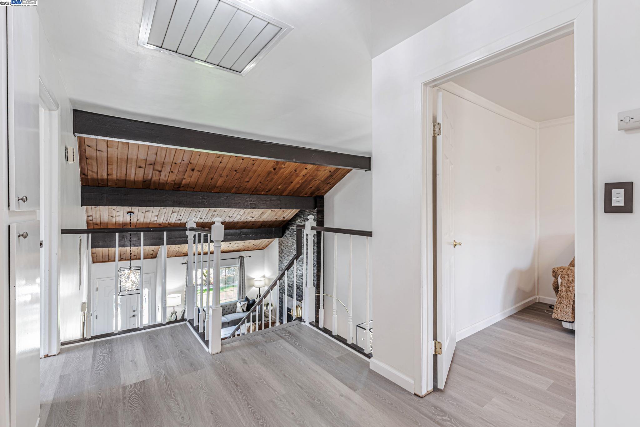 1835 Camino Estrada Concord, CA 94521 - Photo 17 of 27 a view of an empty room with wooden floor and a window
