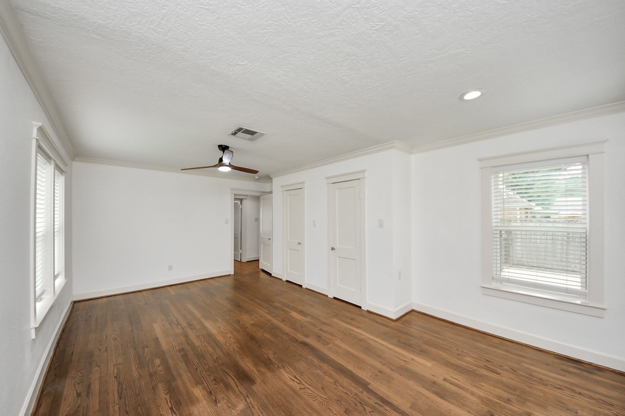 609 Reid Street Houston, TX 77022 - Photo 25 of 48 wooden floor in an empty room with a window