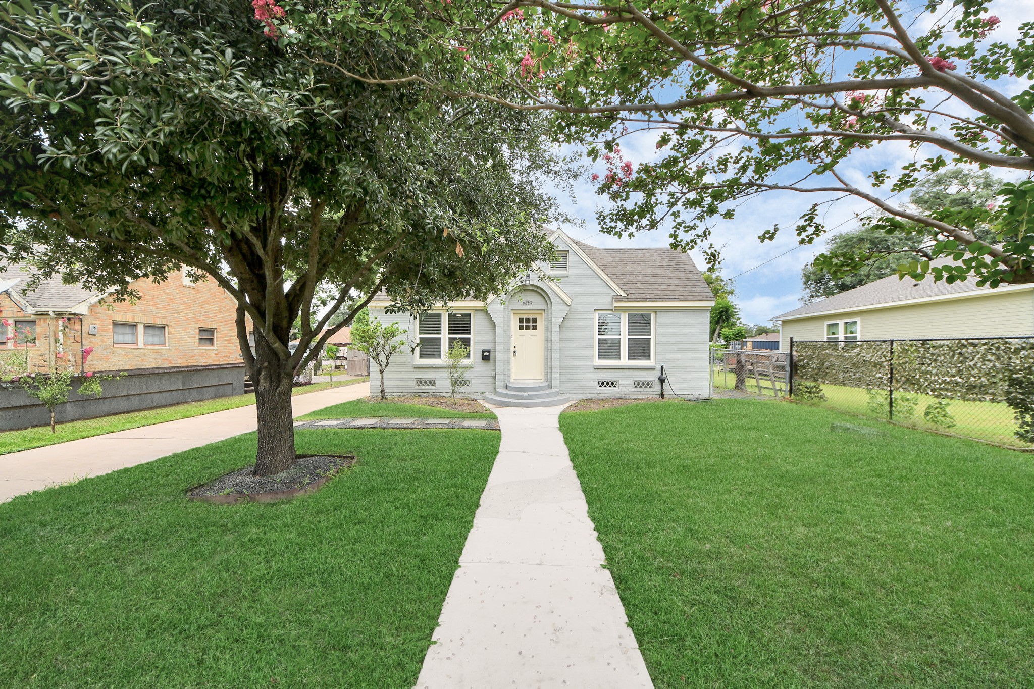 609 Reid Street Houston, TX 77022 - Photo 42 of 48 a view of house with a yard