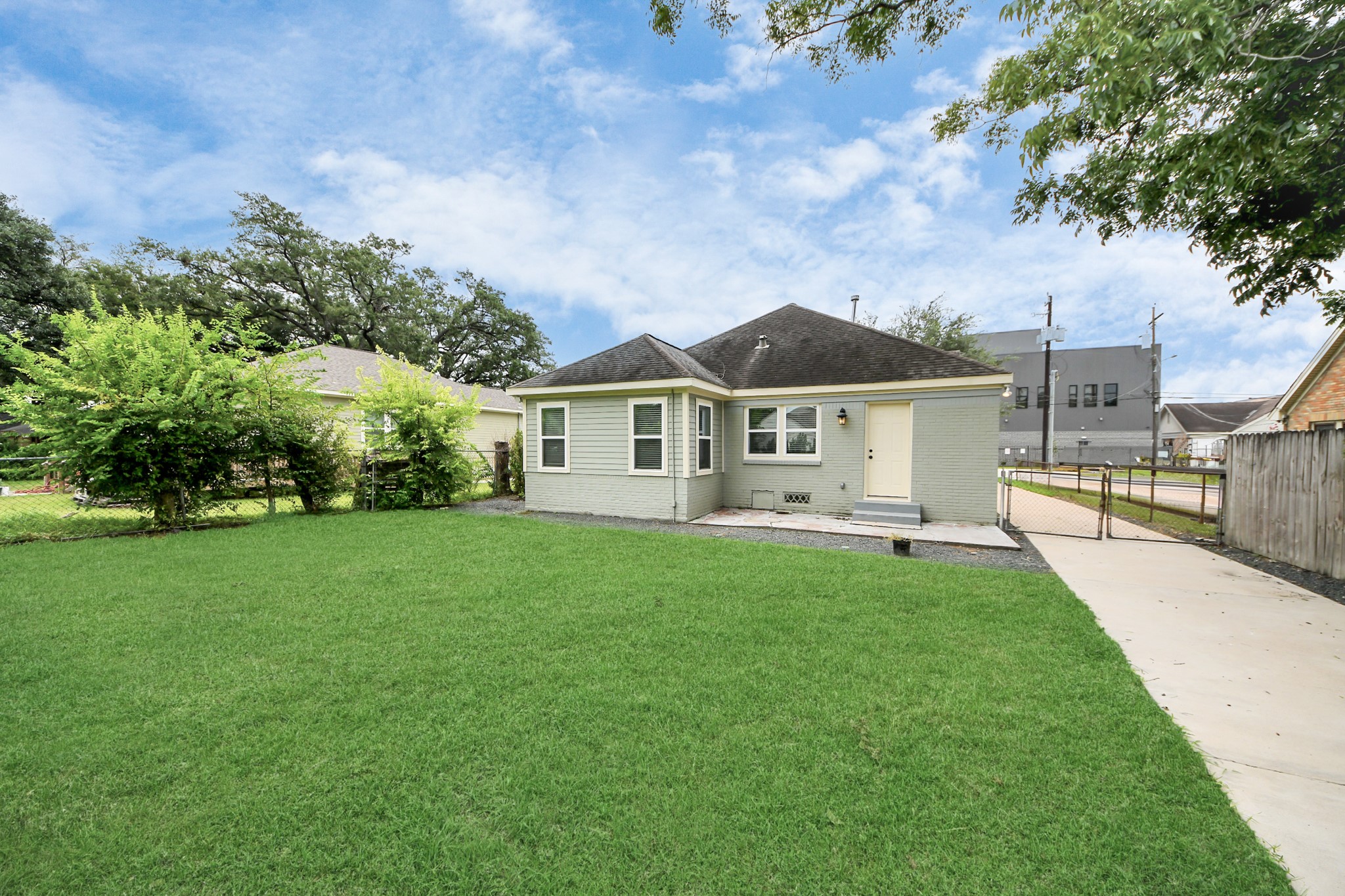 609 Reid Street Houston, TX 77022 - Photo 45 of 48 a view of a yard in front of a house