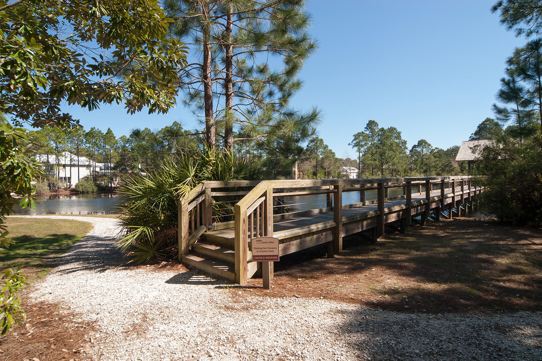 67 Pontchartrain North Santa Rosa Beach Santa Rosa Beach, FL 32459 - Photo 9 of 11 a view of a wooden house with a yard