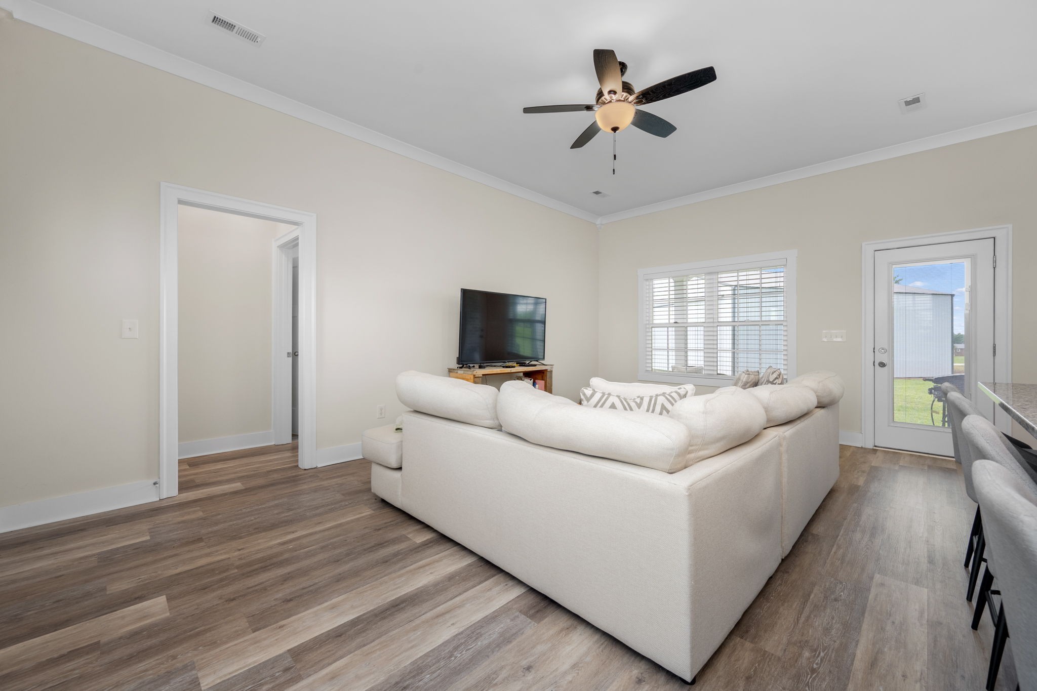 65 Joe Blanton Road Woodbury, TN 37190 - Photo 14 of 61 a living room with furniture and a ceiling fan