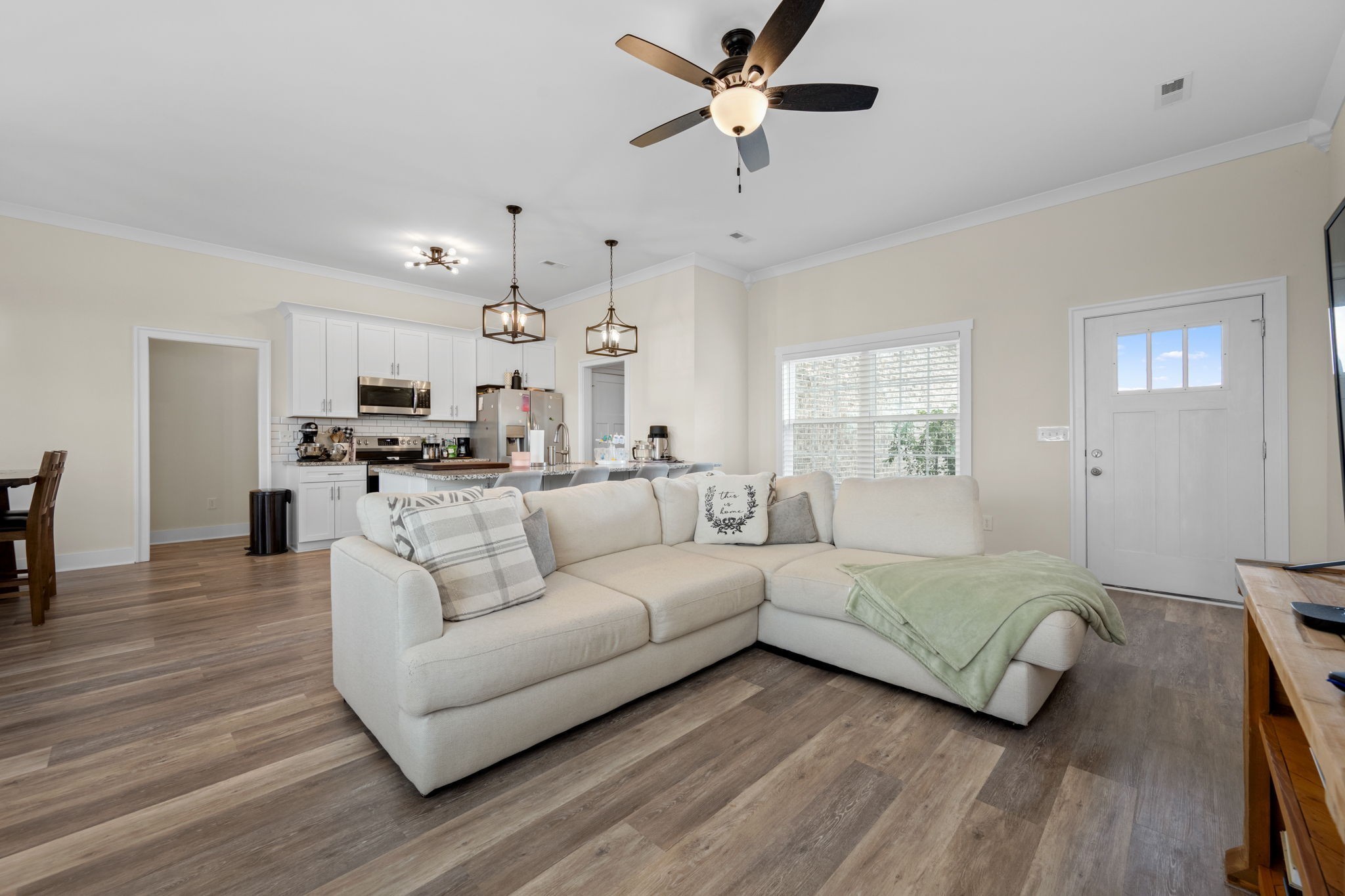 65 Joe Blanton Road Woodbury, TN 37190 - Photo 16 of 61 a living room with furniture and a wooden floor
