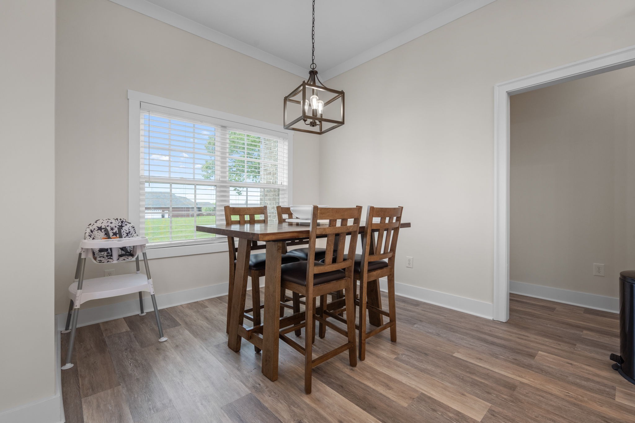 65 Joe Blanton Road Woodbury, TN 37190 - Photo 24 of 61 a view of a dining room with furniture window and wooden floor
