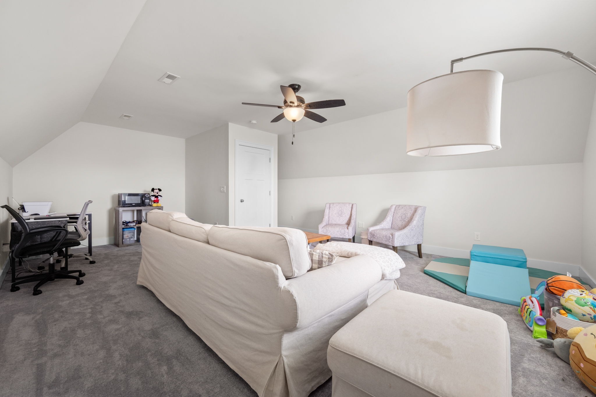 65 Joe Blanton Road Woodbury, TN 37190 - Photo 35 of 61 a living room with furniture and a chandelier