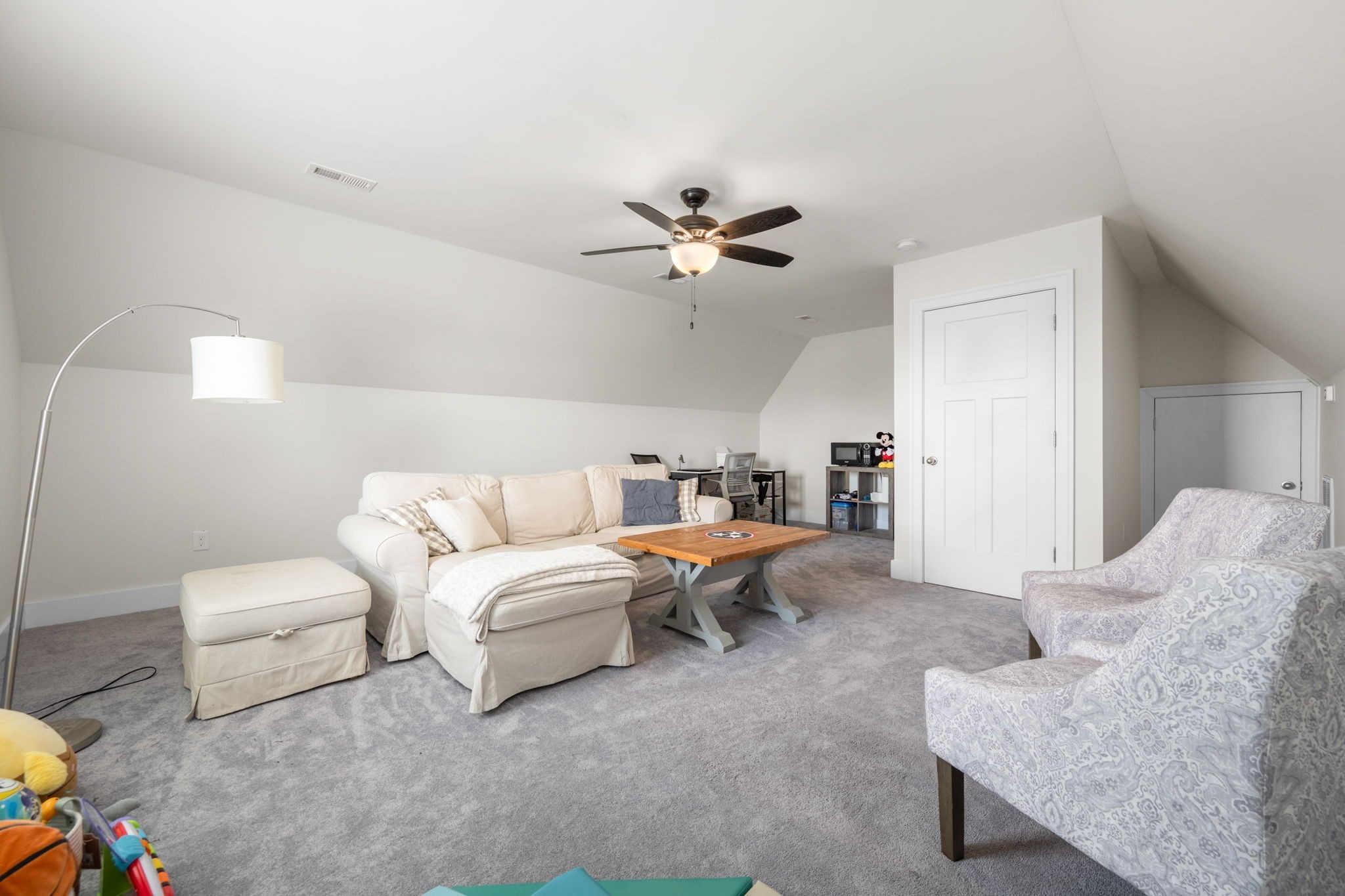65 Joe Blanton Road Woodbury, TN 37190 - Photo 36 of 61 a living room with furniture and a chandelier