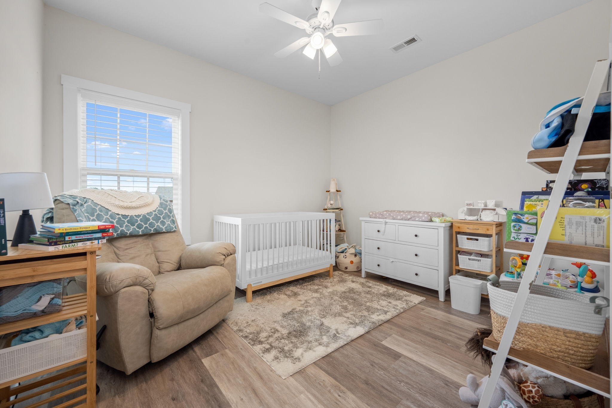65 Joe Blanton Road Woodbury, TN 37190 - Photo 38 of 61 a living room with furniture and a flat screen tv