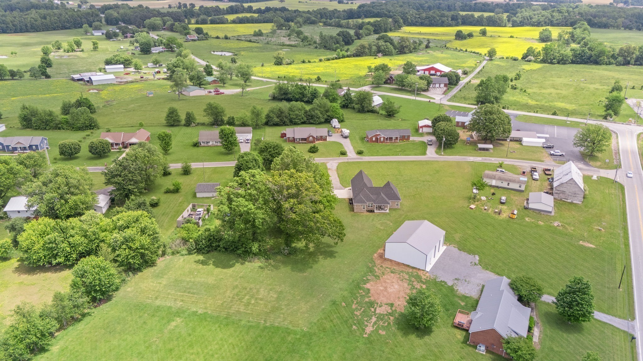 65 Joe Blanton Road Woodbury, TN 37190 - Photo 48 of 61 an aerial view of a houses with outdoor space and street view