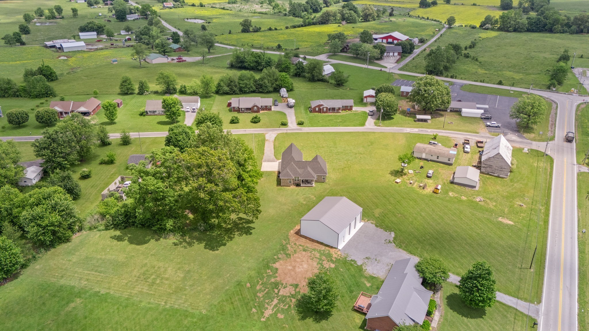 65 Joe Blanton Road Woodbury, TN 37190 - Photo 52 of 61 an aerial view of a residential houses with outdoor space and street view