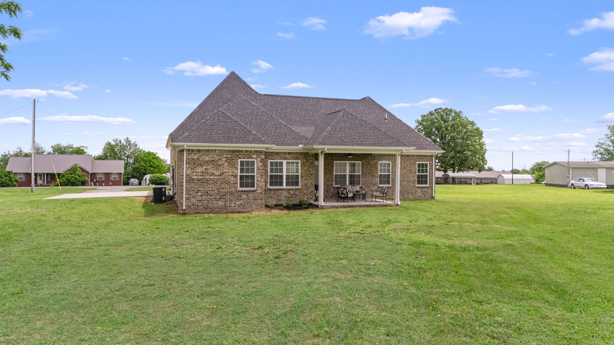 65 Joe Blanton Road Woodbury, TN 37190 - Photo 54 of 61 a view of a house with a backyard