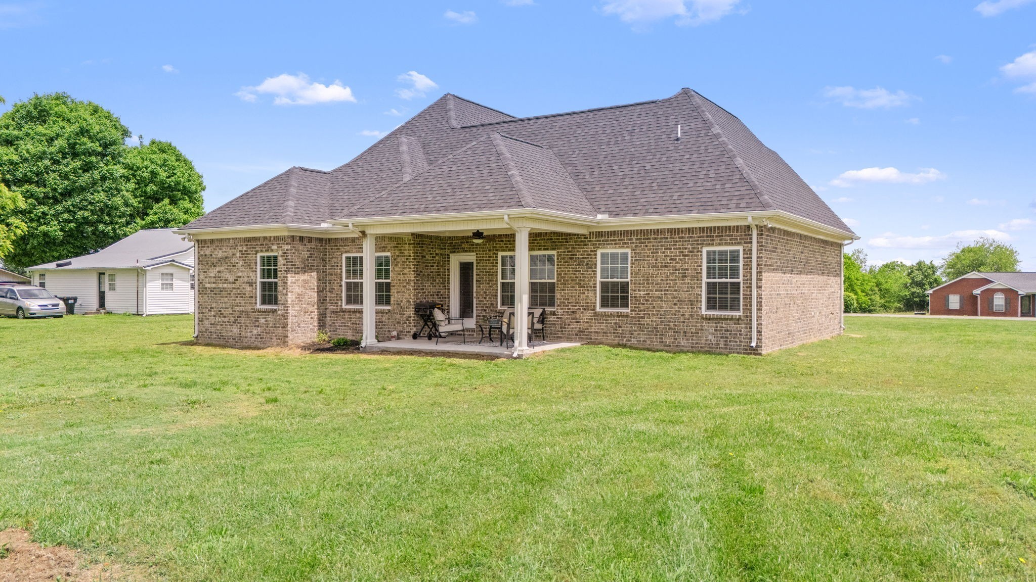 65 Joe Blanton Road Woodbury, TN 37190 - Photo 56 of 61 a view of a house with a backyard