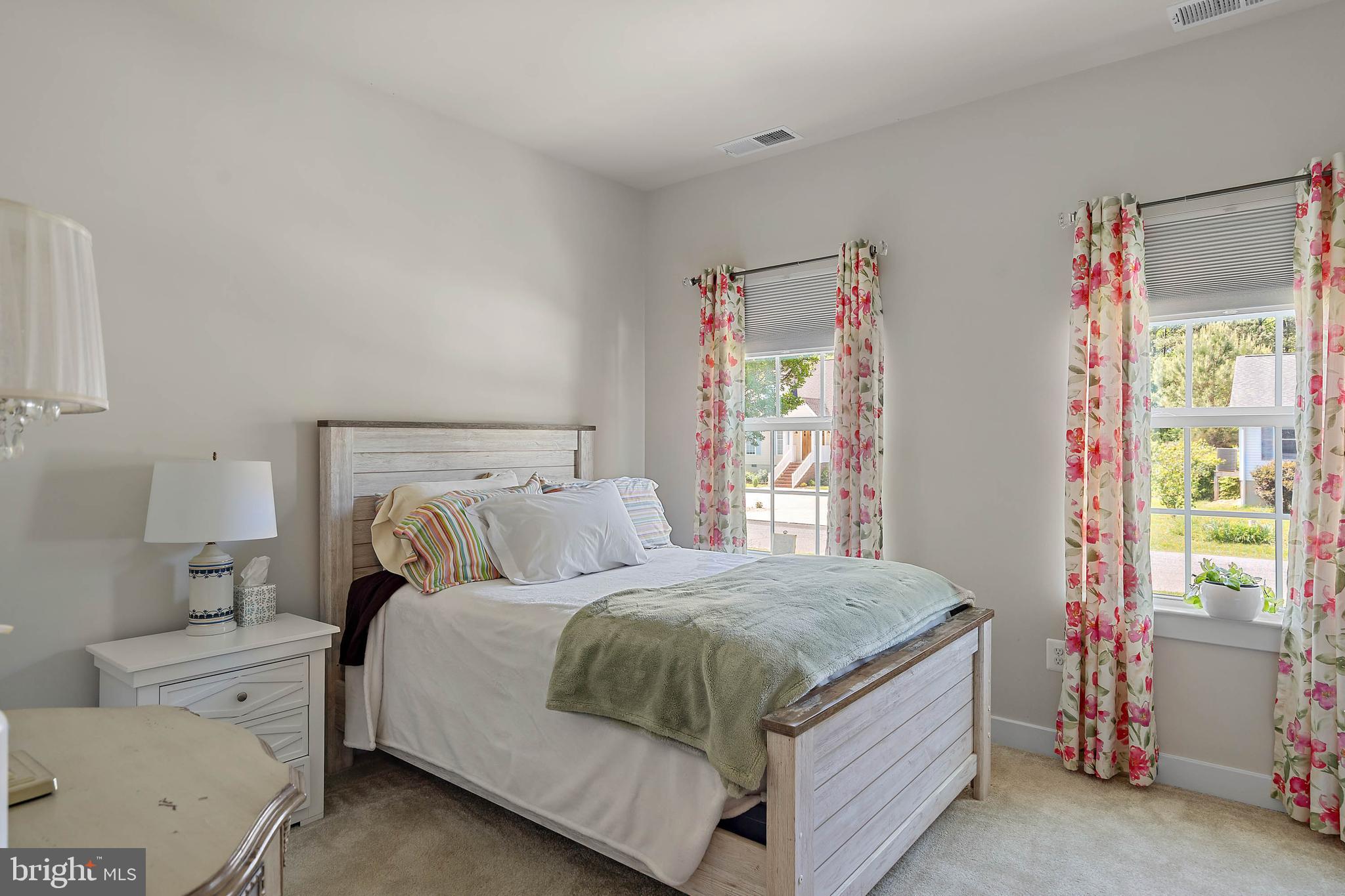 12159 Snug Harbor Road Berlin, MD 21811 - Photo 24 of 72 a bedroom with a bed and a window