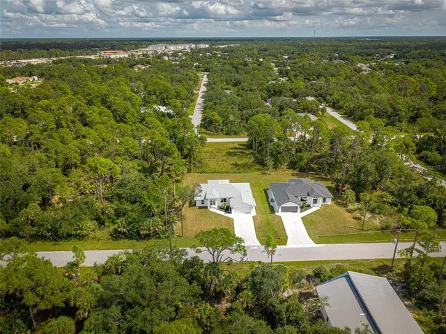 a view of a yard with an outdoor space