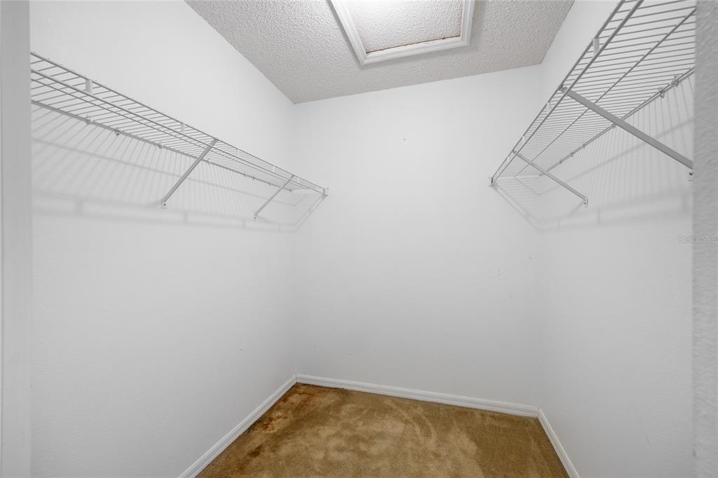8352 Natoma Street Spring Hill, FL 34606 - Photo 23 of 48 a view of small space with racks on the wall