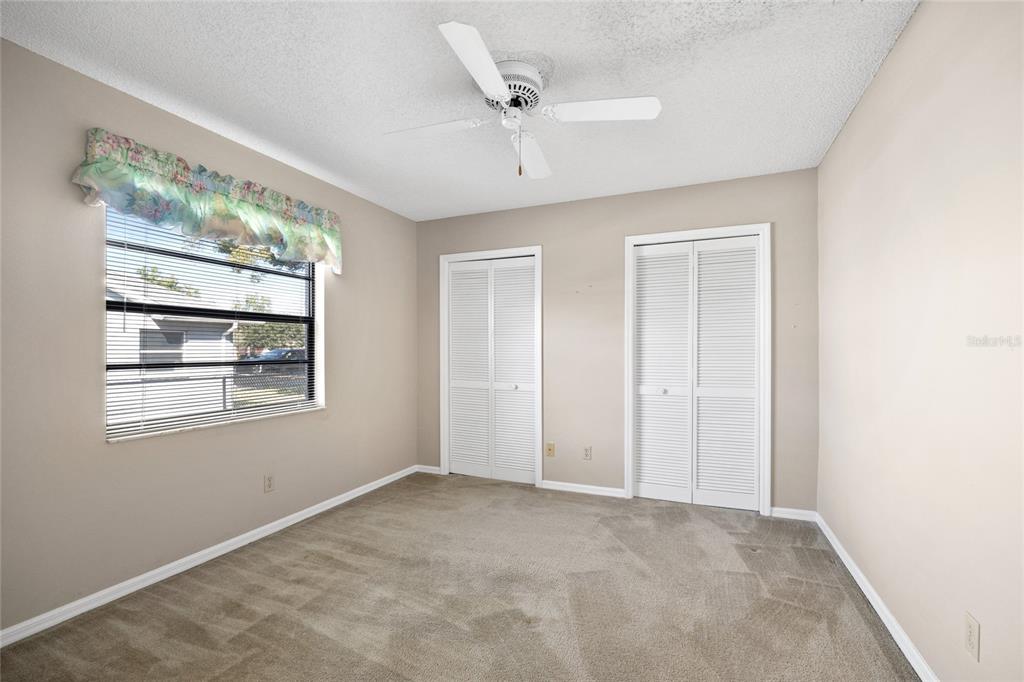 8352 Natoma Street Spring Hill, FL 34606 - Photo 27 of 48 a view of an empty room with a window