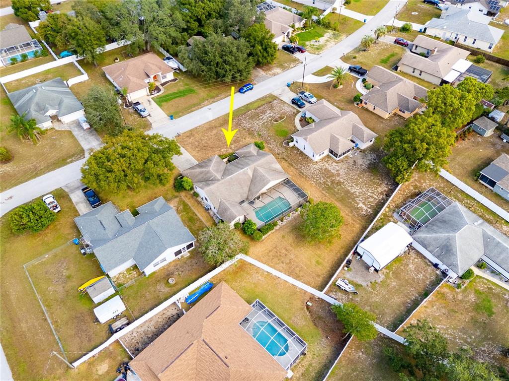 8352 Natoma Street Spring Hill, FL 34606 - Photo 43 of 48 an aerial view of a house with a yard and trees