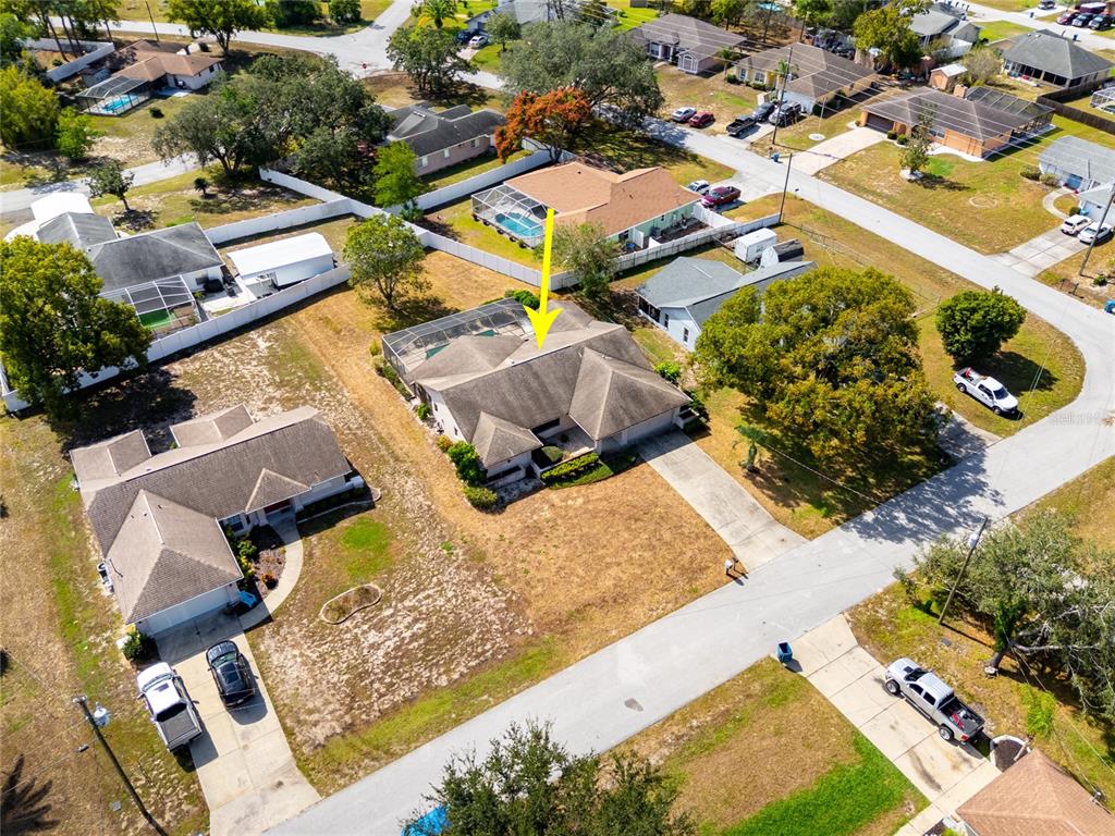 8352 Natoma Street Spring Hill, FL 34606 - Photo 44 of 48 an aerial view of a house with a yard and lake view
