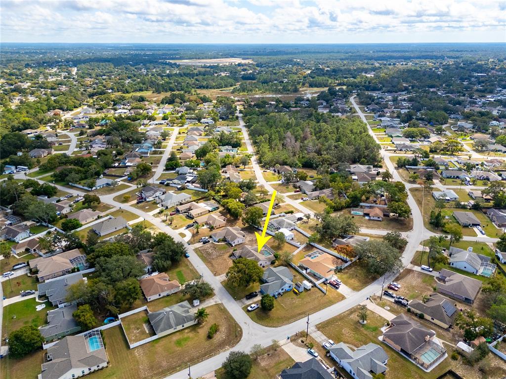 8352 Natoma Street Spring Hill, FL 34606 - Photo 46 of 48 an aerial view of residential building with parking space