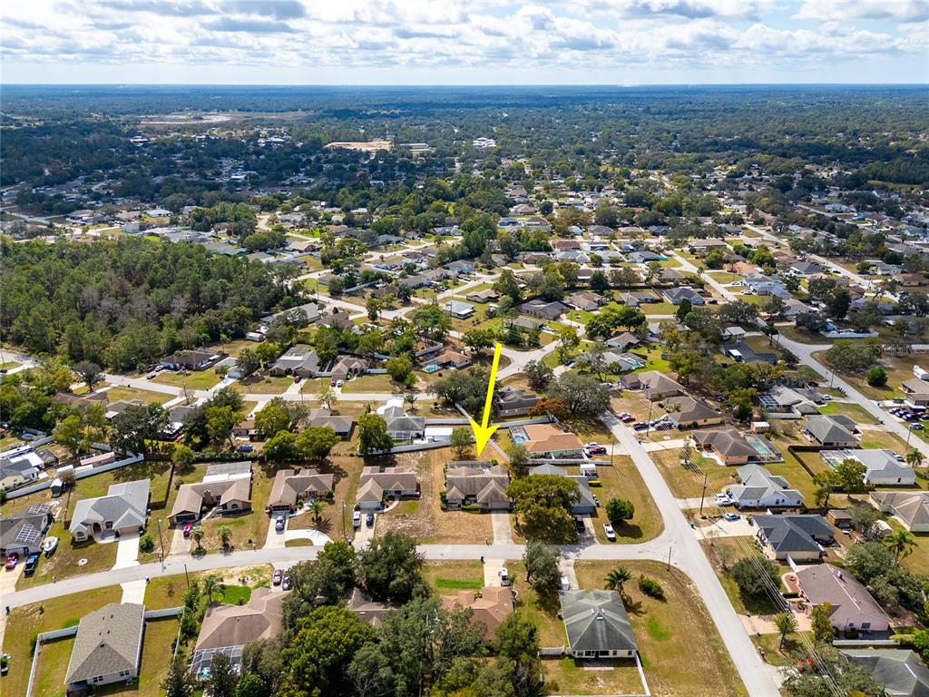 8352 Natoma Street Spring Hill, FL 34606 - Photo 47 of 48 an aerial view of residential building with parking space