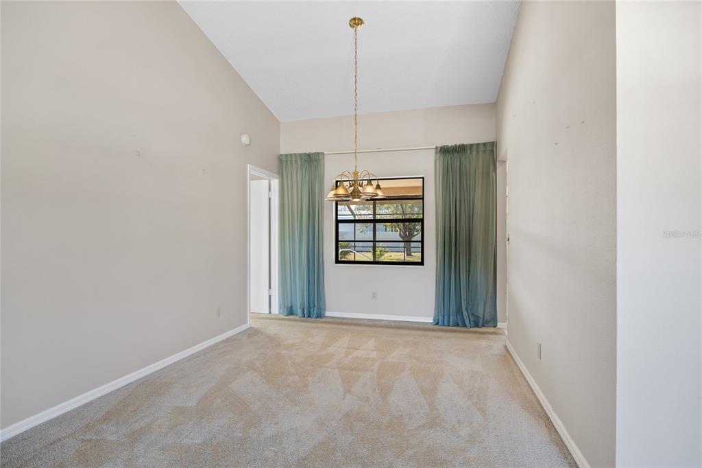 8352 Natoma Street Spring Hill, FL 34606 - Photo 10 of 48 a view of a kitchen with window