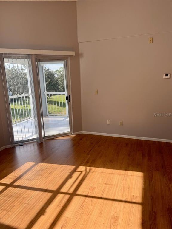 711 Sugar Bay Way, Unit 313 Lake Mary, FL 32746 - Photo 16 of 25 a view of empty room with floor to ceiling window