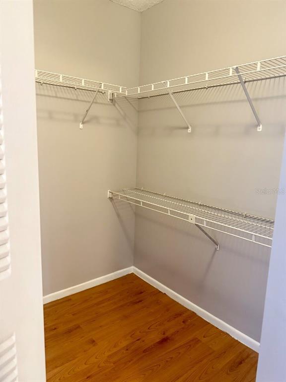 711 Sugar Bay Way, Unit 313 Lake Mary, FL 32746 - Photo 21 of 25 a view of a room with racks on the wall