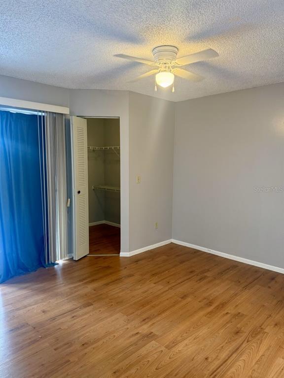 711 Sugar Bay Way, Unit 313 Lake Mary, FL 32746 - Photo 23 of 25 a view of a livingroom with wooden floor