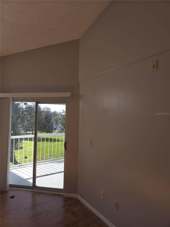 711 Sugar Bay Way, Unit 313 Lake Mary, FL 32746 - Photo 3 of 25 a view of empty room with wooden floor and fan