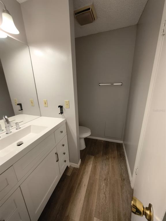 711 Sugar Bay Way, Unit 313 Lake Mary, FL 32746 - Photo 10 of 25 a bathroom with a double vanity sink and mirror