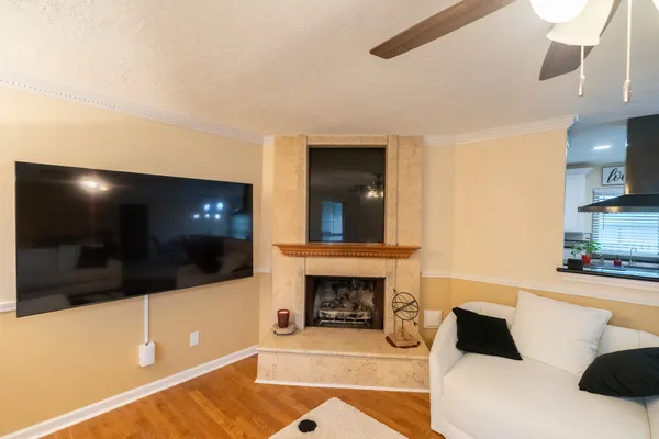 an empty room with wooden floor